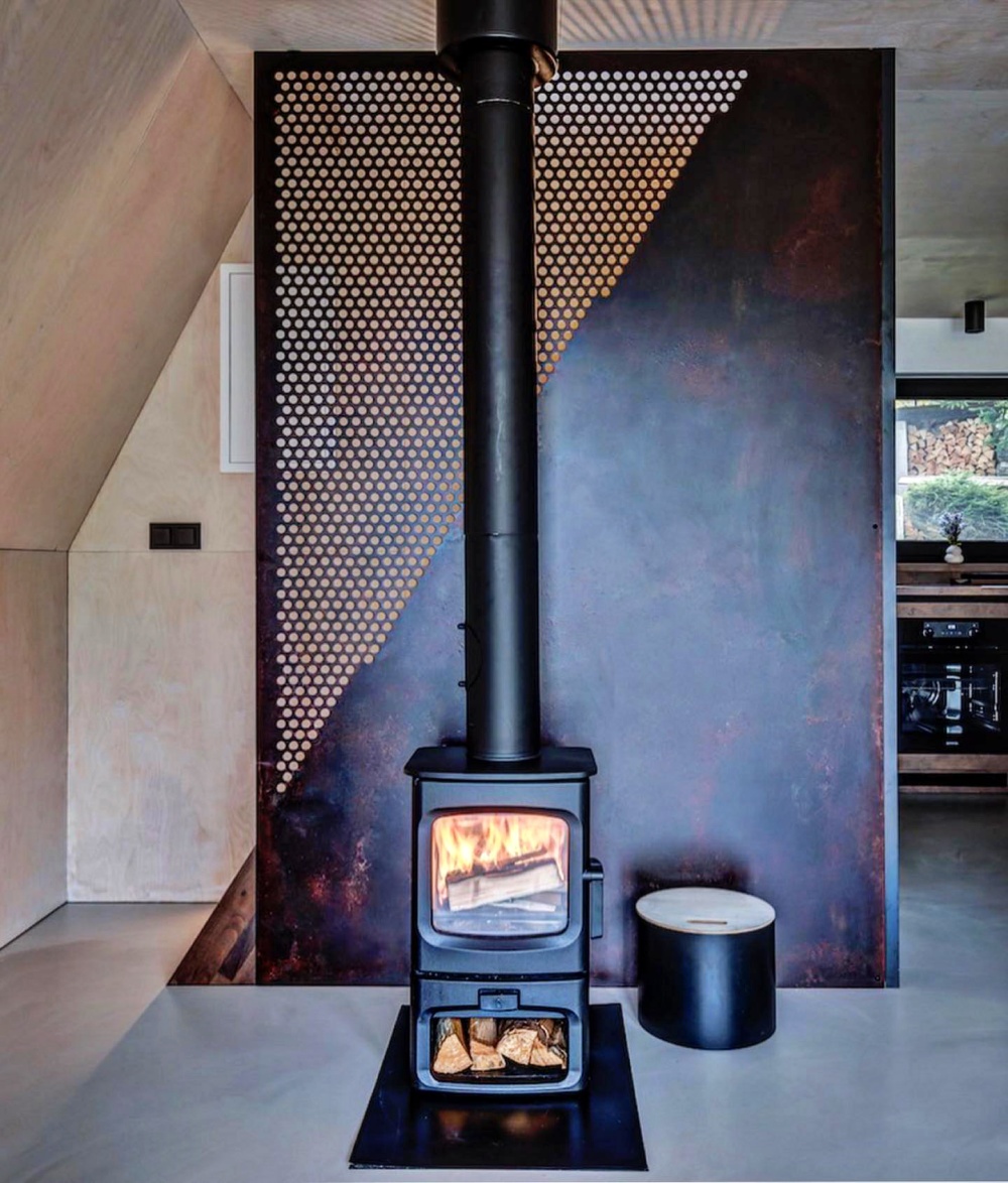 Enhance your fireplace with a wood stove heat shield - Charnwood